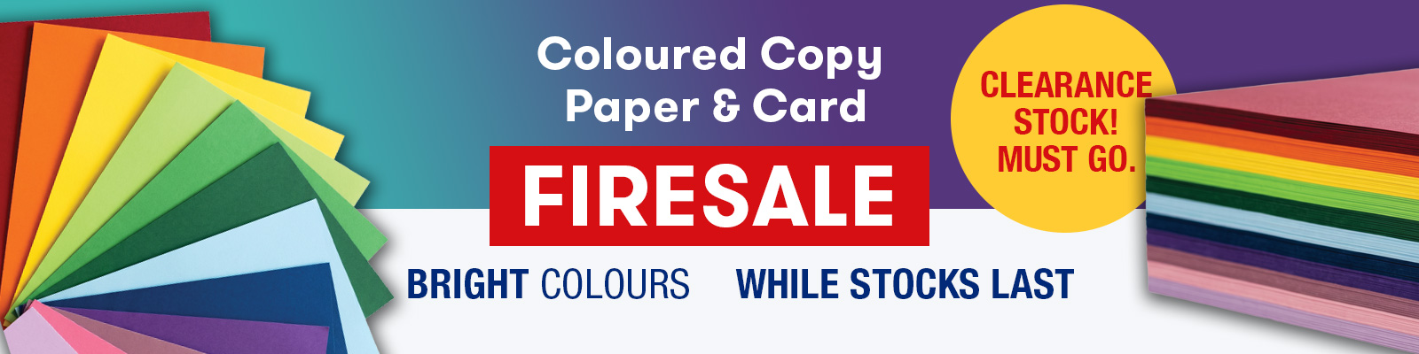 Coloured paper in a fan arrangement and a pile of coloured paper for a firesale